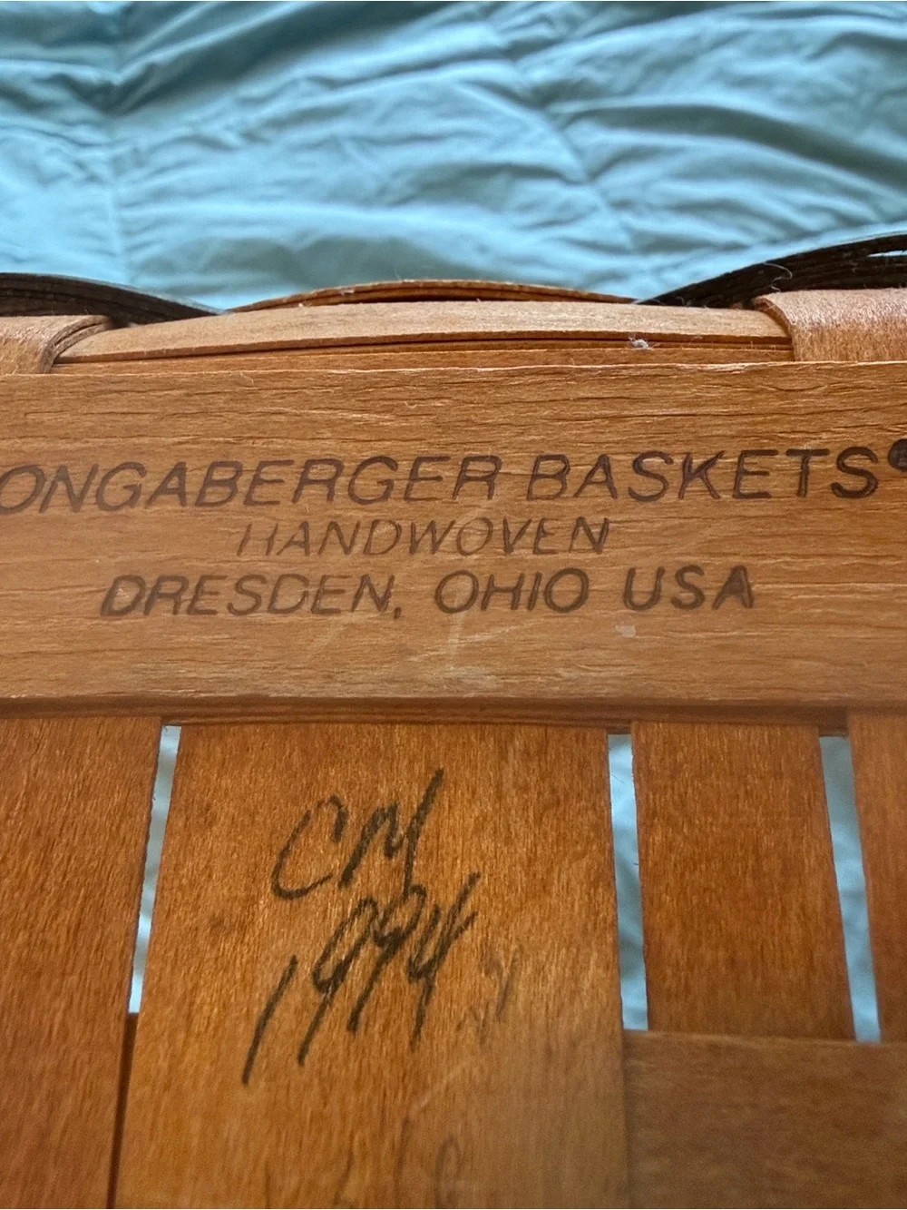 Longaberger Two-Tone Woven Basket in Brown and dark green.